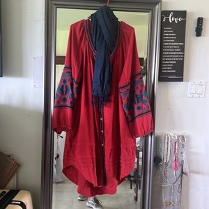 It is a great piece to wear in the fall as a dress or over jacket. Is cotton